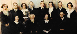 Robert and Elizabeth Canet with their twelve children.