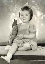 Studio portrait of Diana (Mann) Kupke aged three, taken in Caulfield in Victoria about 1945.