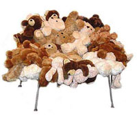 A soft chair made from soft toys